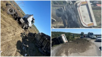 Accident cumplit la Lețcani, județul Iași: un camion s-a răsturnat peste un autoturism. O persoană a murit, alta a fost găsită inconștientă